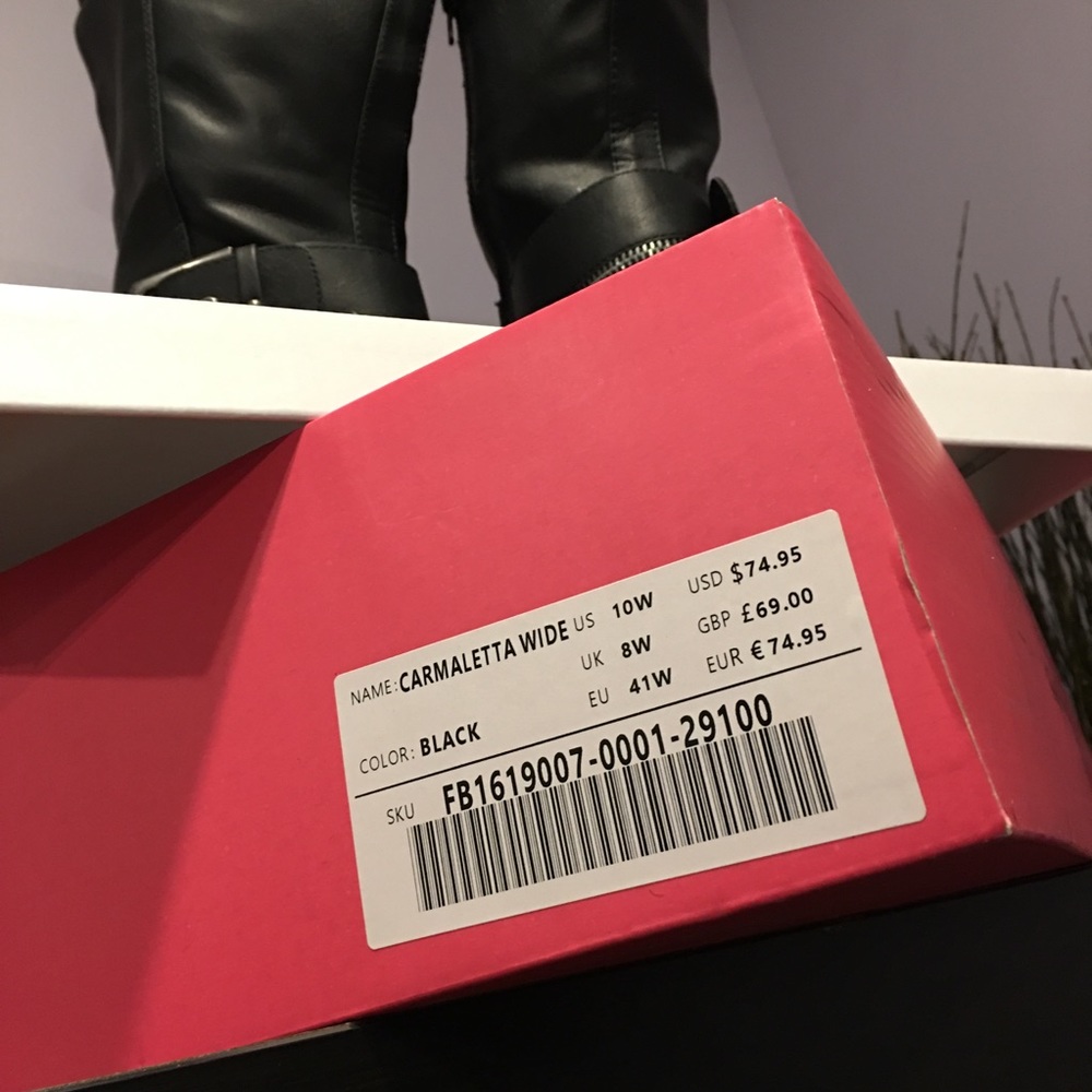 Woman’s Carmaletta wide, thigh high buckled boots.